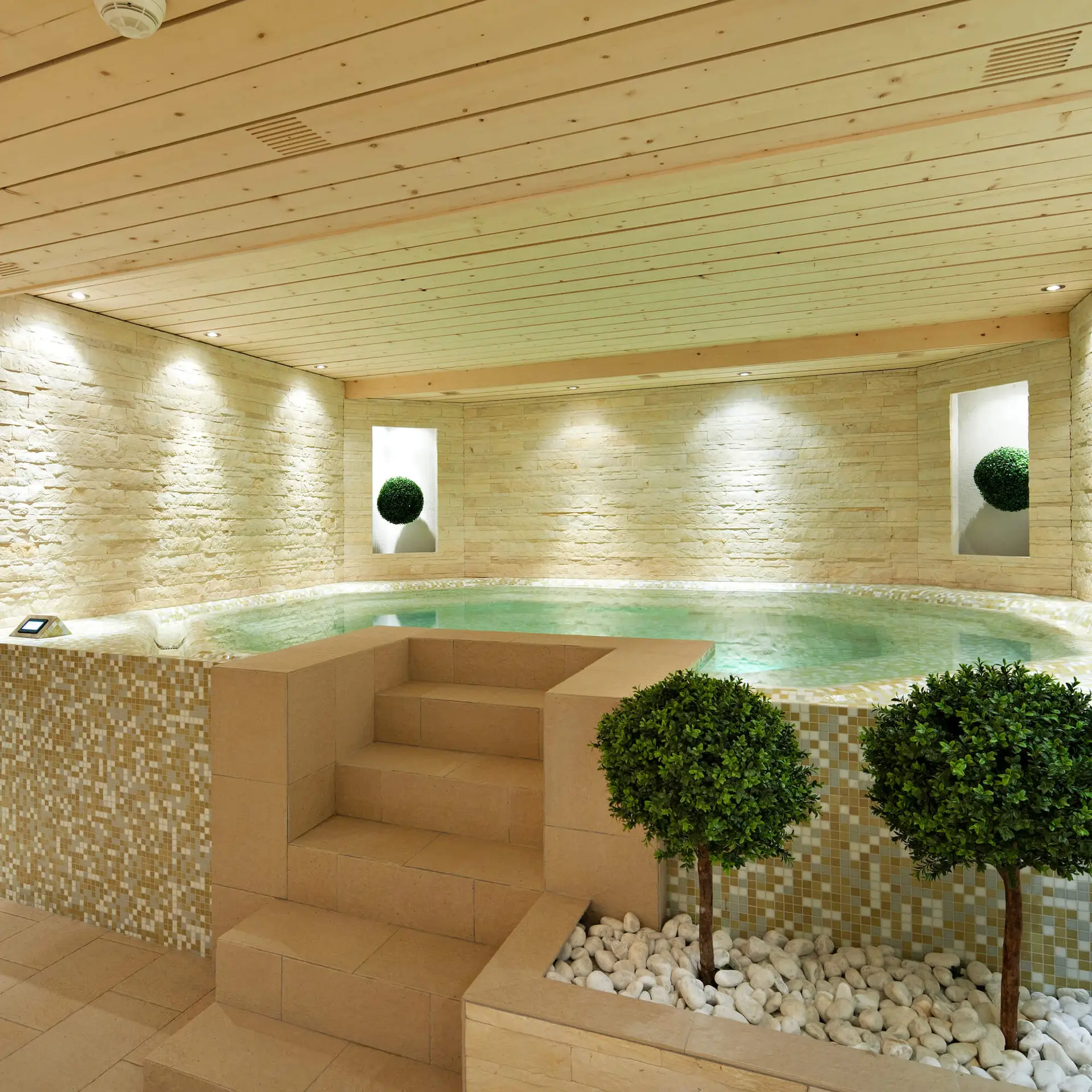 The jacuzzi in the stone-walled spa of Hotel Vanessa, Verbier